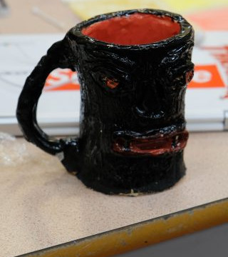 Photos of some of the 'vessels' Anto's art classes have made this quarter, some candids of students working, and some photos of the classroom environment