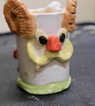 Photos of some of the 'vessels' Anto's art classes have made this quarter, some candids of students working, and some photos of the classroom environment