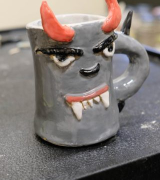 Photos of some of the 'vessels' Anto's art classes have made this quarter, some candids of students working, and some photos of the classroom environment