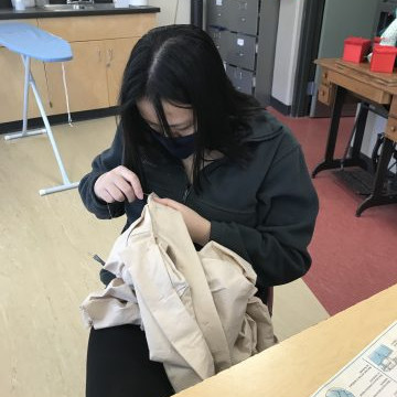 Students in the Textiles 9-12 class working on their pattern layouts for coats, pajama pants, flared pants and culottes.