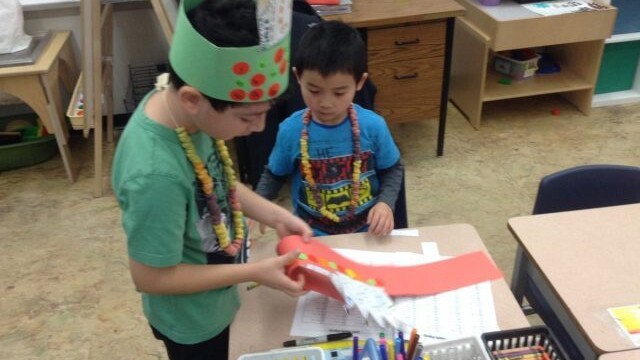 They made headbands with 20 stickers and counted by fives to one hundred.