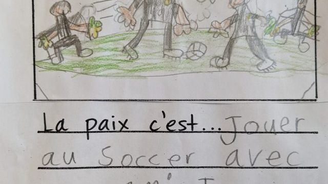 Peace is playing soccer with my friends.