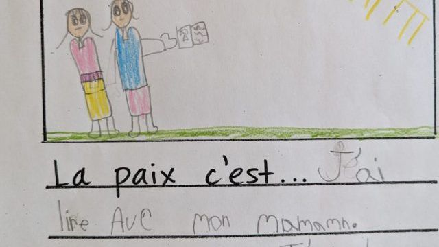 Peace is reading with my mom.